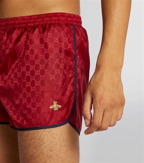 gucci supreme bee swim shorts